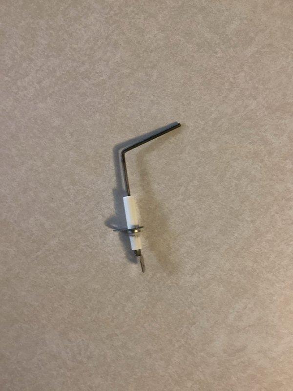 Responded to no-heat call for 15-year-old Bryant furnace exhibiting intermittent flame shutdown with blower continuing to run and occasional odor. Diagnosed burnt flame sensor as the root cause, performed cleaning as temporary solution. Ordered replacement flame sensor to be installed at follow-up appointment to ensure reliable heating operation.