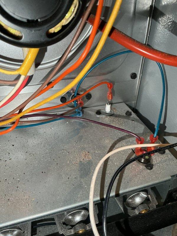 Responded to no-heat call for 2-year-old K&S installed furnace. Diagnosed and cleaned dirty flame sensor which tested within specification at 2.5 micro amps after service. Identified restrictive air filter as additional issue; recommended using a Merv 7 or 8 filter with monthly replacement. Verified all components operating within specifications; system is now fully operational.