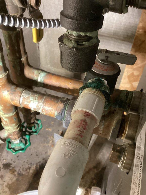 Responded to service call regarding pressure relief valve leak on boiler system. Performed comprehensive system inspection including relief valve, pumps, zone valves, expansion tank, and drain valves. Adjusted auto fill and verified bypass closure. System now operating normally with no leaks observed.