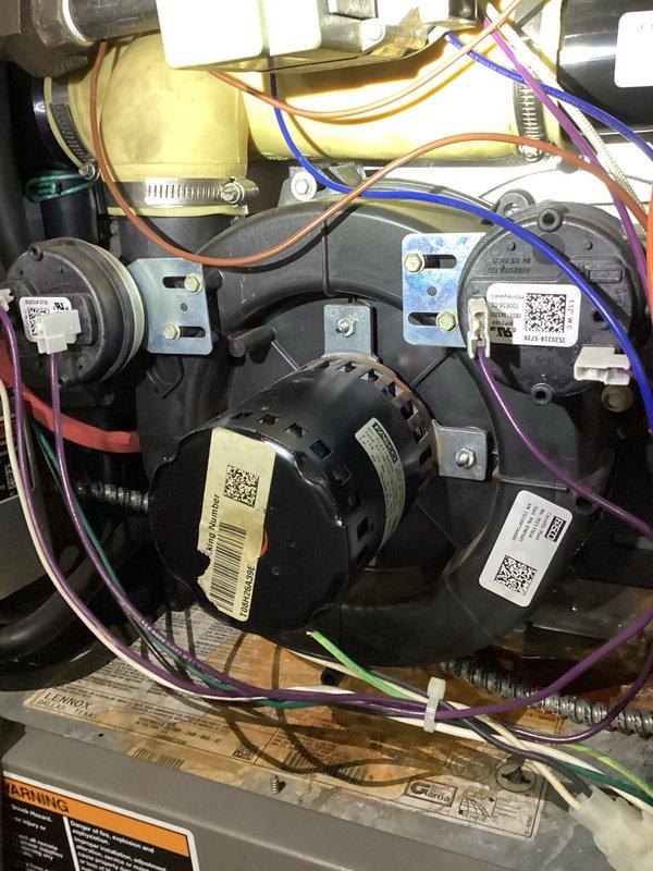Diagnosed excessive noise in 13-year-old Lennox natural gas furnace. Inspection of internal components revealed the inducer motor showing significant wear, causing the loud operational noise. Advised homeowner that inducer motor replacement is recommended, but customer opted to source and install replacement parts independently.
