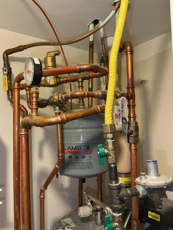 Responded to service call for non-functional boiler. Diagnosed failed power vent blower on combination tank water heater preventing system startup. Replaced power vent blower assembly, restoring proper operation of heating system and domestic hot water.