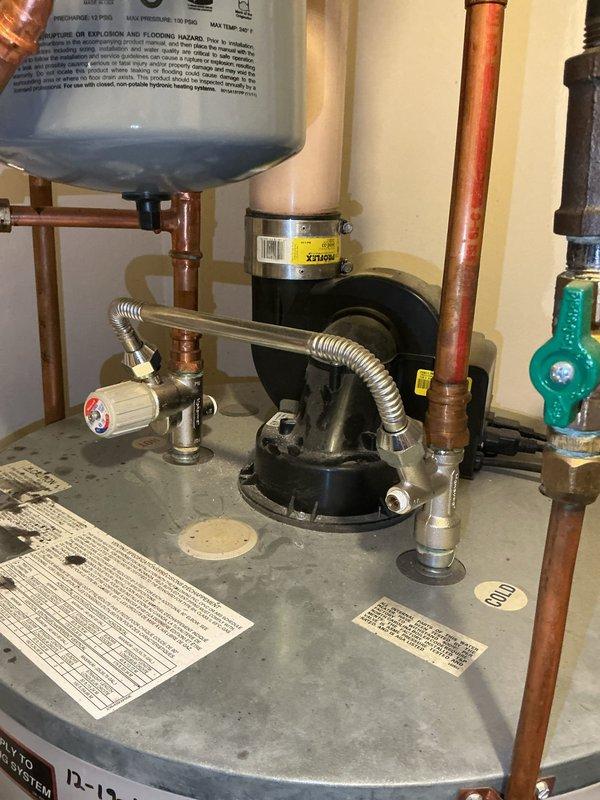 Responded to service call for non-functional boiler. Diagnosed failed power vent blower on combination tank water heater preventing system startup. Replaced power vent blower assembly, restoring proper operation of heating system and domestic hot water.