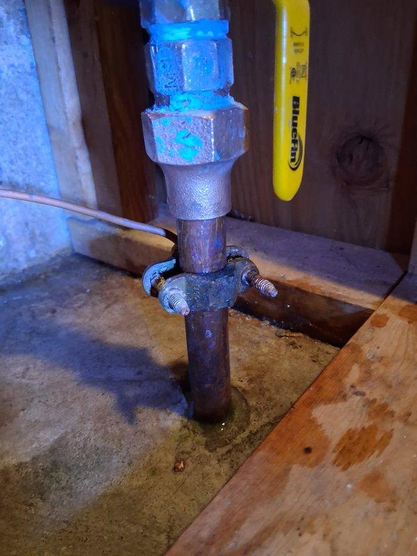 Inspected leak at water service connection before meter. Identified damaged flare fitting on copper water line as source of water leak. Scheduled return visit to install new flare on copper water service once city completes water shutoff at street.