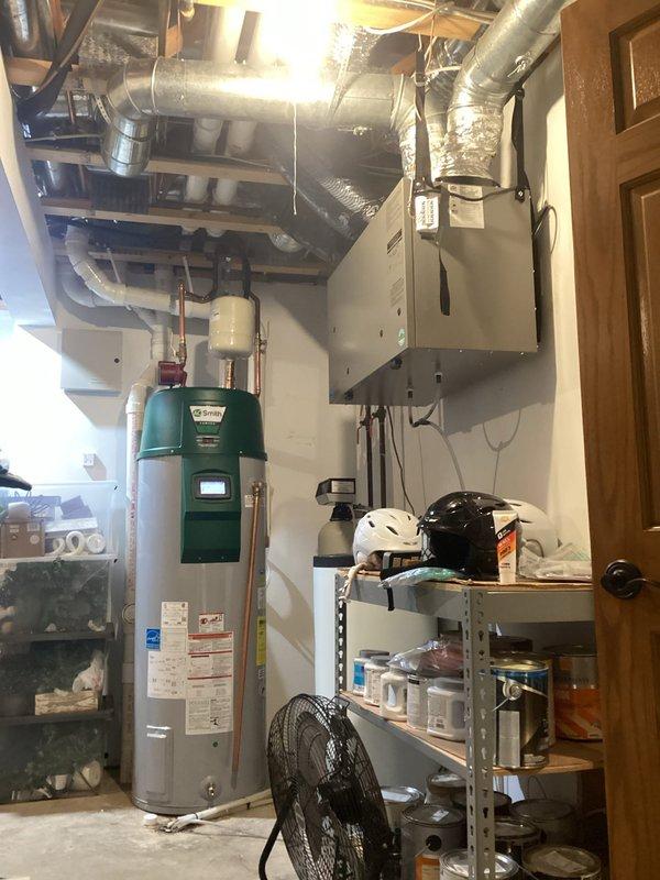 Performed comprehensive tune-up on gas furnace per maintenance agreement. Inspected and tested all components: filter noted as requiring replacement, blower assembly clean and balanced, electrical connections within specifications, and heat exchanger integrity confirmed. System operated properly during 20-minute test run with 45° temperature rise. Verified condensate drainage and venting functionality. Customer (Kyle) informed of filter replacement need and declined service on garage unit.