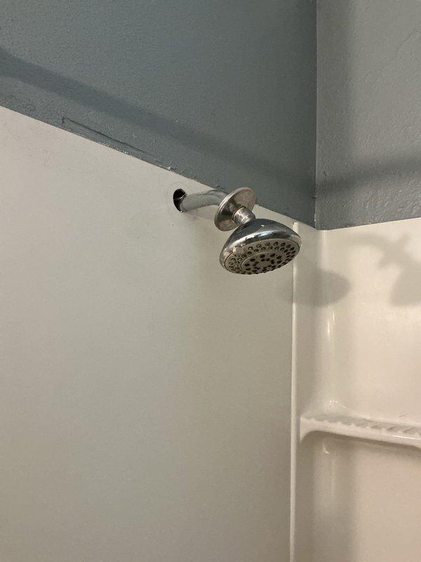 Replaced outdated shower valve with customer-provided new unit. Removed existing valve and associated piping, then installed and secured new valve through wall cavity. Conducted pressure testing to verify proper operation with no leaks.