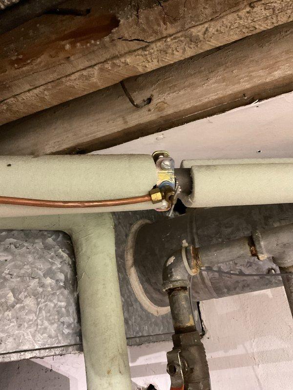 Performed scheduled maintenance on 27-year-old Lennox furnace (170,000 BTU single stage) with previously replaced heat exchanger. System operational at time of inspection. Noted significantly clogged condensate lines requiring future replacement; discussed equipment age and maintenance recommendations with homeowners.