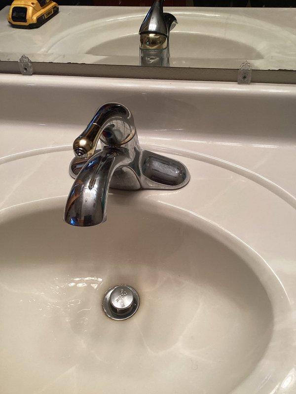 Conducted plumbing inspection at rental property, identifying significant corrosion on tank tea and kitchen sink shut-off valve (010 type). Documented bathroom fixtures and existing Culligan water treatment system. Recommended replacement of corroded components and recline of tankless water heater, with service appointment scheduled for formal pricing.