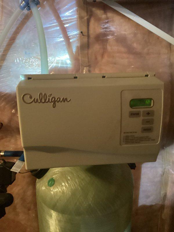 Conducted plumbing inspection at rental property, identifying significant corrosion on tank tea and kitchen sink shut-off valve (010 type). Documented bathroom fixtures and existing Culligan water treatment system. Recommended replacement of corroded components and recline of tankless water heater, with service appointment scheduled for formal pricing.