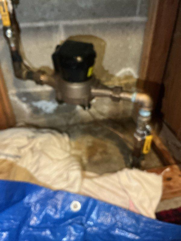 Completed residential plumbing inspection to address water leakage issue. Identified faulty flare on copper line coming through floor. After city water shutoff, replaced adapter and flare nut to resolve the leak.