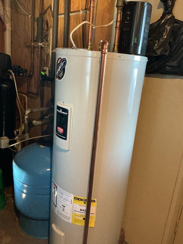 Performed scheduled maintenance flush on customer's two-year-old water heater with minimal sediment accumulation. Identified and repaired leaking copper pipe in the mechanical room during service. Completed full drain down and flush of water heater system, verified all repairs for leaks, and restored system to proper operation.