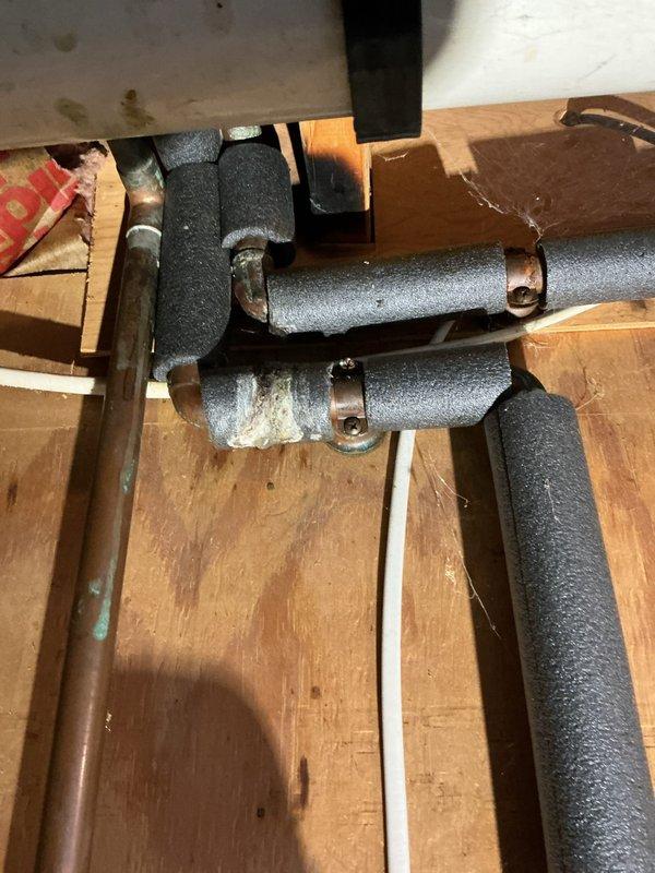 Performed scheduled maintenance flush on customer's two-year-old water heater with minimal sediment accumulation. Identified and repaired leaking copper pipe in the mechanical room during service. Completed full drain down and flush of water heater system, verified all repairs for leaks, and restored system to proper operation.