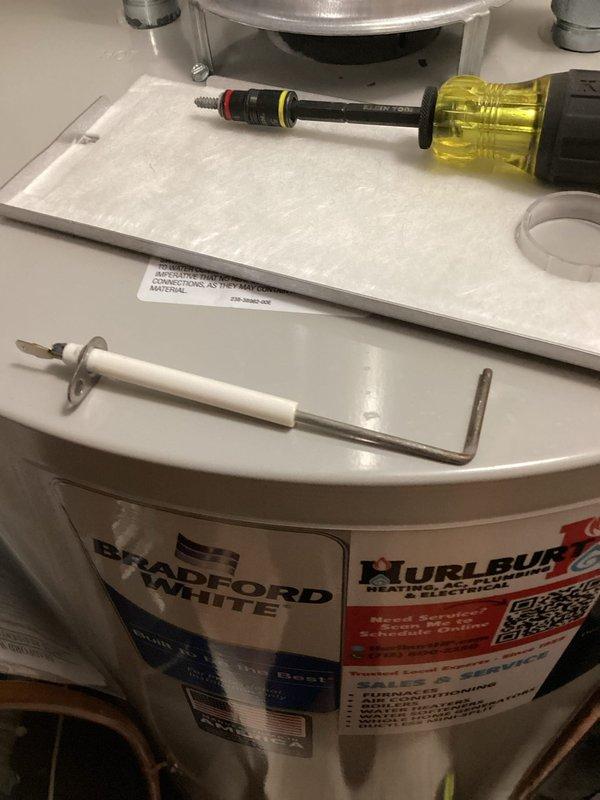 Performed scheduled furnace tune-up on Bradford White unit of unknown age. Discovered critical electrical issue with service switch showing cracking and arcing, creating safety hazard. Implemented temporary repair to restore operation while documenting system with photos including filter condition. Arranged for electrician follow-up to replace faulty switch and advised customer regarding upcoming electrical inspection.