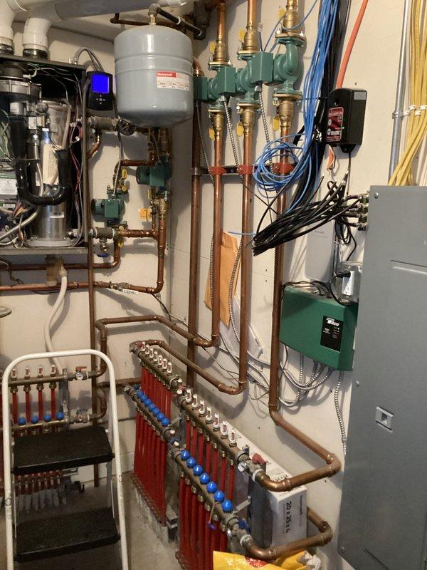 Diagnosed intermittent ignition failure on Weil-McLain boiler. Removed and cleaned igniter with visible buildup, cleaned condensate trap to prevent potential ignition issues, and observed minor fouling in heat exchanger. Parts order submitted for replacement igniter and scheduled follow-up maintenance to perform complete system tune-up.