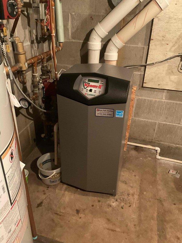 Responded to service call for boiler leaking from pressure relief valve. Diagnosed issue as overfilled expansion tank causing excessive system pressure. Drained water from expansion tank to restore proper operation. Verified all pumps functioning correctly and system returned to normal operation.