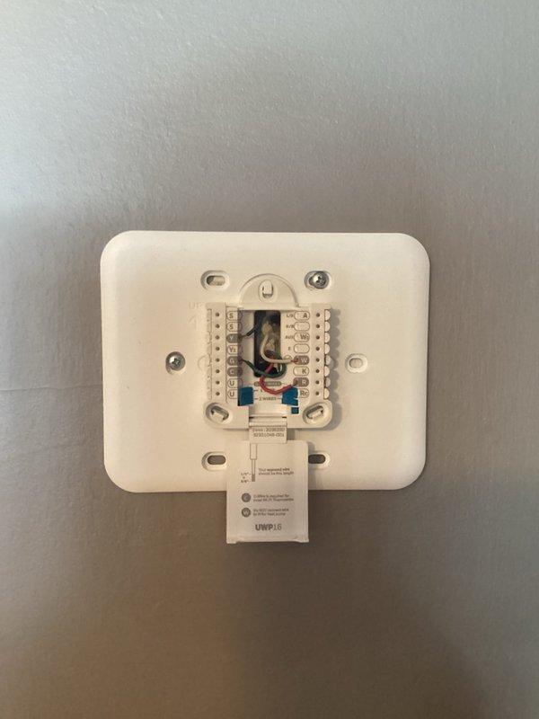 Installed customer-supplied thermostat and corrected existing furnace operational issues. Removed improper W1-to-W2 jumper and adjusted dip-switch settings to enable proper staging sequence (10 minutes in first stage before engaging second stage). Noted and informed customer about aging inducer motor showing signs of noise and leakage. Scheduled follow-up consultation for inducer replacement estimate and potential system replacement options.