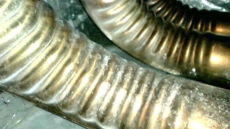 Performed routine tune-up service on gas furnace system. Unit operating within normal parameters, but noted customer using portable room humidifiers. Explained potential overheating risks associated with these devices and provided estimate for proper whole-home humidifier installation.