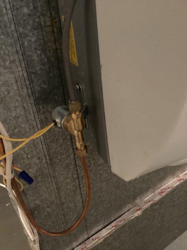 Diagnosed non-functioning Aprilaire whole-home humidifier on 2-year-old system. Confirmed water supply presence but identified failed solenoid valve as root cause. Ordered replacement solenoid with scheduled return visit for installation and documented system condition with photos.