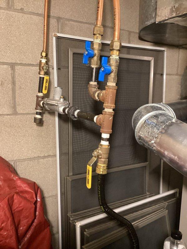 Responded to customer concern regarding previous HVAC company's claim that our installation was not to code. Inspection revealed that the gas lines in question predated our installation. Found and replaced a leaking union fitting, verified B-vent furnace venting was properly installed, and confirmed no carbon monoxide leakage risk exists. Performed comprehensive leak check on all gas connections to ensure system safety and compliance.
