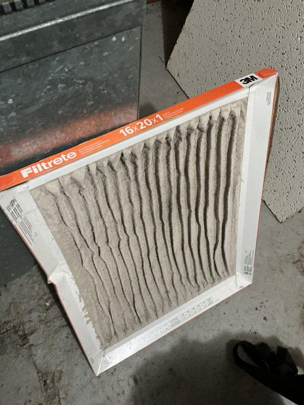 Responded to no-heat call for 6-year-old furnace displaying high limit lockout code due to overheating. Diagnosed restricted airflow caused by severely clogged 16x20x1 filter, dirty blower wheel, and contaminated secondary heat exchanger. Performed blower wheel cleaning and installed electronic air cleaner to resolve the issue. Recommended maintaining either monthly replacement of MERV-8 (or lower) pleated filters or continued use of electronic air cleaner to prevent recurrence.