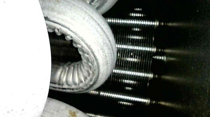 Diagnosed no heat issue on 10+ year old Goodman furnace with repeated ignition failure and lockout. Inspection revealed heavily rusted burners causing inconsistent ignition and a leaking cold end header box at typical failure point. Replaced burners to restore heating function and recommended header box replacement, which customer elected to defer. Heat exchanger inspection showed no current integrity issues.