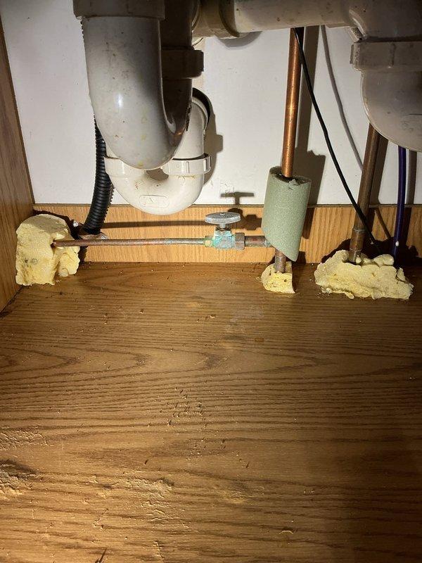 Responded to service call for low water pressure in 40-year-old residence. Discovered severely corroded main shut-off valve requiring immediate replacement. Successfully installed new main shut-off valve to restore proper water pressure and replaced dishwasher valve to enable appliance installation. Advised customer that multiple valves showed significant deterioration and recommended evaluation for complete re-piping due to the extent of necessary repairs.