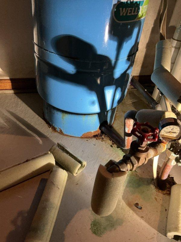 Responded to service call for low water pressure in 40-year-old residence. Discovered severely corroded main shut-off valve requiring immediate replacement. Successfully installed new main shut-off valve to restore proper water pressure and replaced dishwasher valve to enable appliance installation. Advised customer that multiple valves showed significant deterioration and recommended evaluation for complete re-piping due to the extent of necessary repairs.