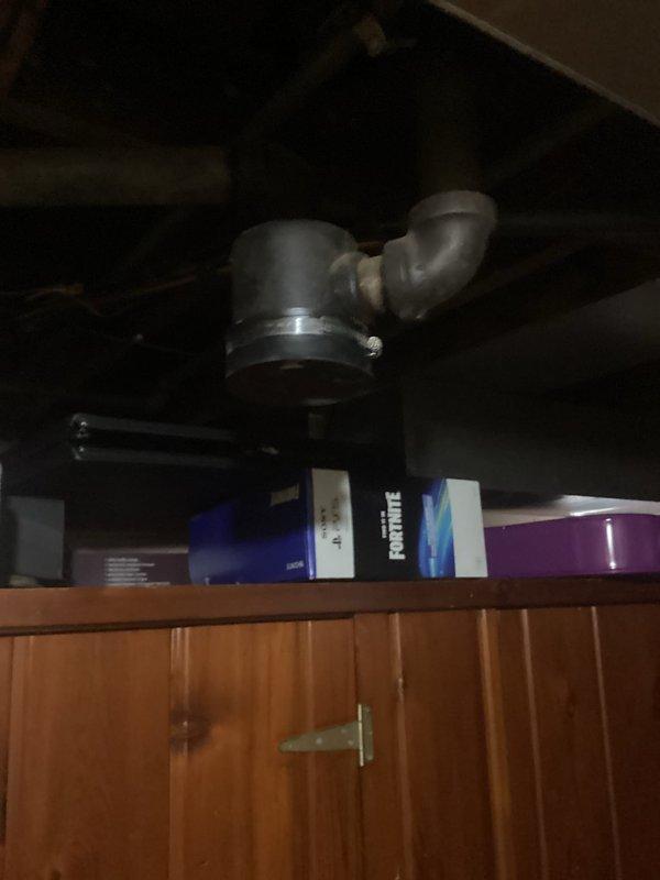 Responded to service call for clogged bathtub drain on upper floor. Diagnosed drum trap plugged with foreign material (fecal matter). Successfully cleared obstruction by snaking drum trap and drain line to stack, restoring proper drainage function.