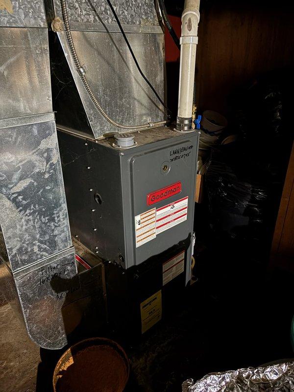 Responded to no-heat call for an approximately 15-year-old Goodman furnace. Diagnosed failed transformer as the primary issue. Performed heat exchanger inspection with camera, noting one possible concern that was determined to be a rust spot from water exposure. Replaced transformer and restored system operation, though unit exhibited suboptimal performance. Recommended follow-up maintenance visit before next heating season for comprehensive system evaluation.