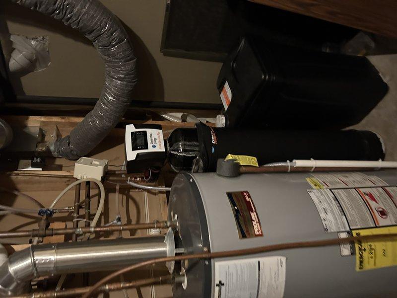 Responded to service call for multiple plumbing issues. Diagnosed and repaired two leaking toilets, including replacement of wax ring on one unit. Successfully installed customer-supplied toilet. Water heater system was inspected and appeared to be functioning properly with no visible leaks in the connection points or valves.