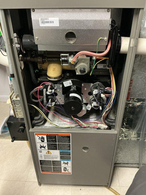 Conducted second opinion assessment of 2011 furnace heat exchanger, confirming severe rust and corrosion likely caused by leaking AC evaporator coil condensation. Visual inspection revealed areas approaching perforation that could potentially release carbon monoxide into the home. Recommended heat exchanger replacement or complete furnace replacement with customer preference for Lennox system.