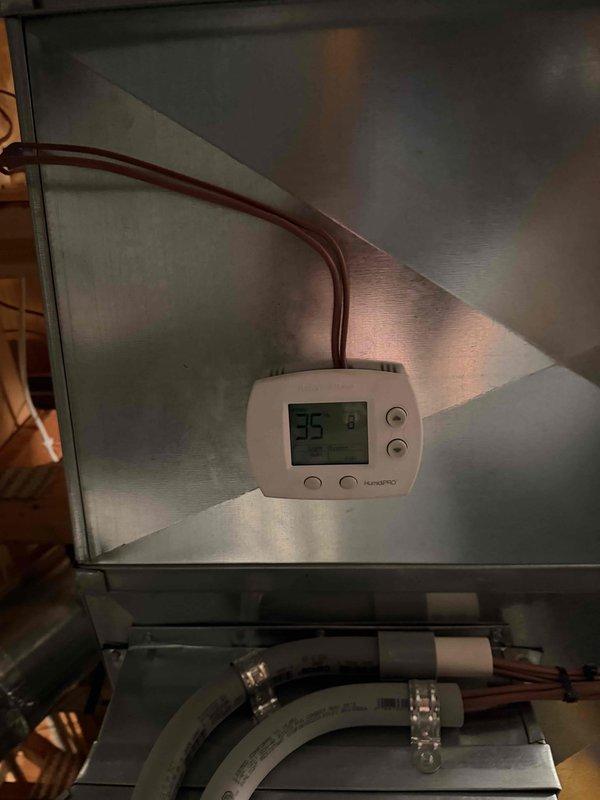 Replaced faulty steam humidifier system with new unit as sold by Mike B. Installation included new humidistat, drain line, and patching of previous mounting holes in ductwork. System is now properly installed with digital controls and properly connected to existing HVAC infrastructure.