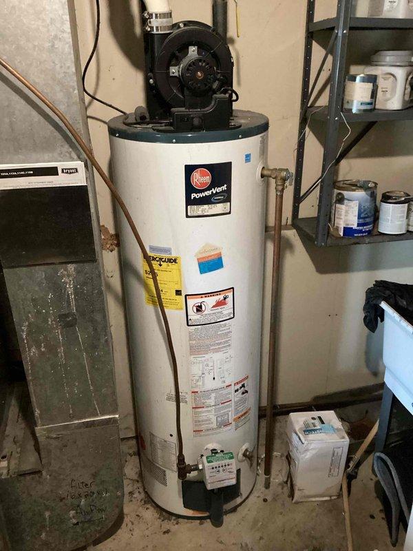 Responded to service call for low water pressure and no hot water. Diagnosed failing water heater as the root cause. Inspected Rheem PowerVent unit, discussed replacement options with tenant, and reported findings to property owner per instructions.