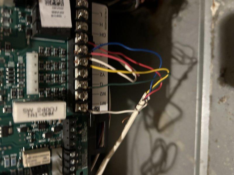 Responded to no heat service call for a furnace issue. Diagnosed faulty thermostat and replaced the existing E30 thermostat with a simpler T1 model as requested by the customer. Rewired connections at terminal block to accommodate standard thermostat configuration and verified proper system operation through temperature testing.