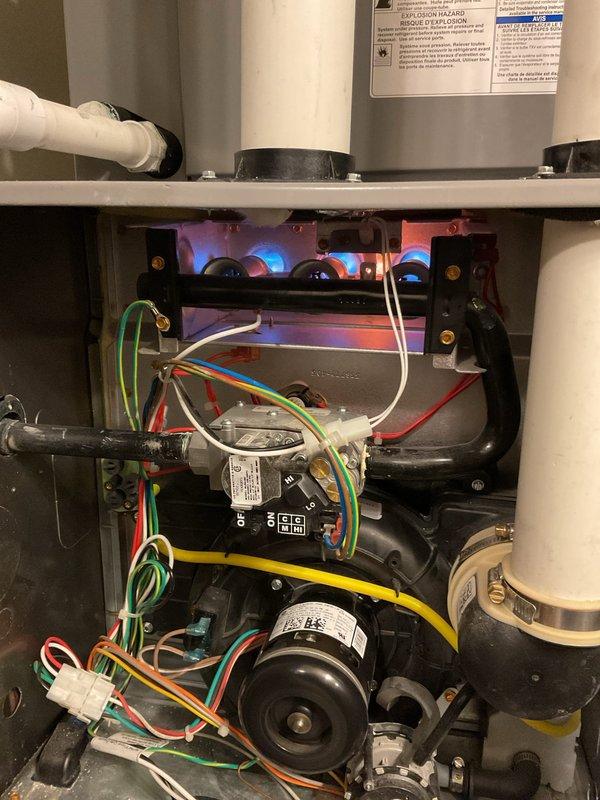 Performed annual furnace tune-up on 5-year-old HFR system. Corrected improperly installed filter (backwards), installed new filter, and added directional indicators to filter rack for proper future installation. Inspected combustion chamber, verified proper flame pattern, and examined all electrical connections and safety components. All systems functioning properly with no issues identified.