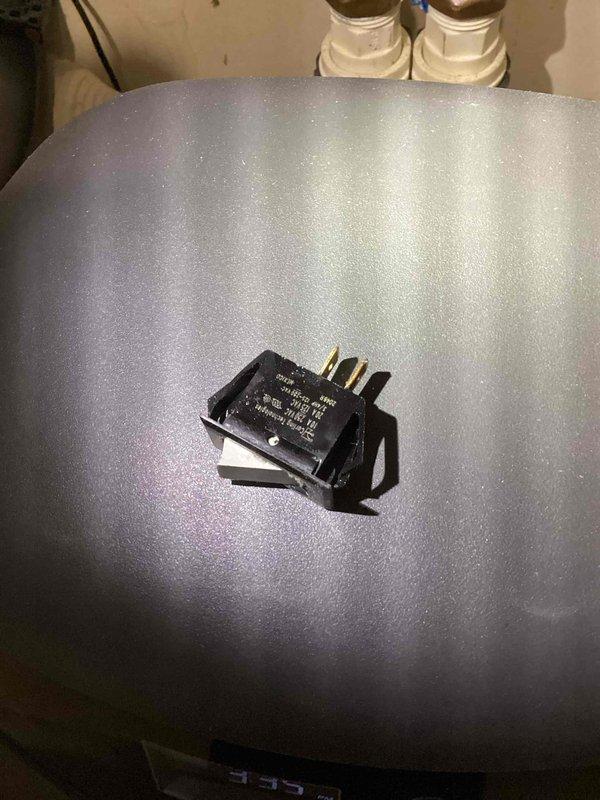 Responded to service call for a non-functioning Goodman furnace. Diagnosed issue with faulty door switch causing system failure; when blower cabinet door was removed, furnace resumed operation. Temporarily bypassed door safety switch to restore heating function and documented evidence of electrical arcing within switch. Initiated parts order for replacement door switch.