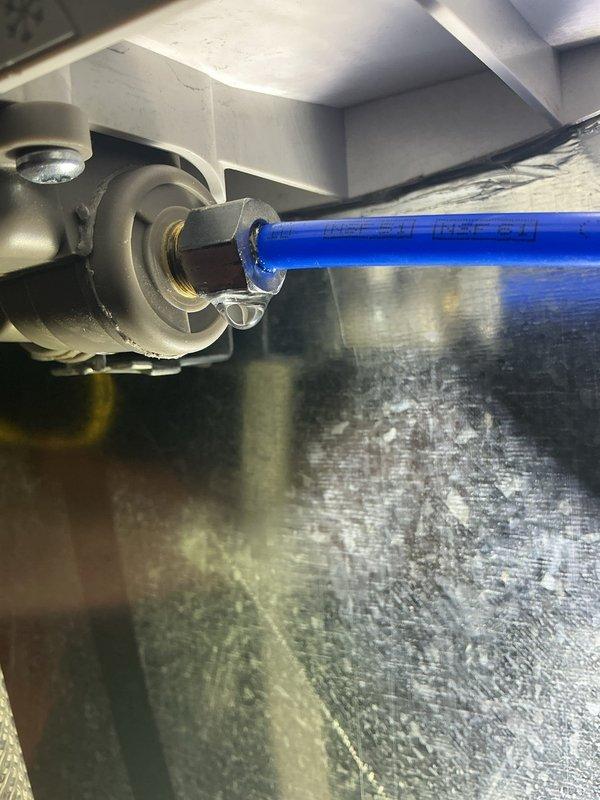 Addressed humidifier leak issue caused by over-tightened copper compression fitting on solenoid valve hose. Replaced damaged fitting and successfully stopped leak. Scheduled follow-up appointment for installation of new controller and outdoor sensor, with plan to either install nylon compression fitting or add hardening piece to hose for permanent solution.