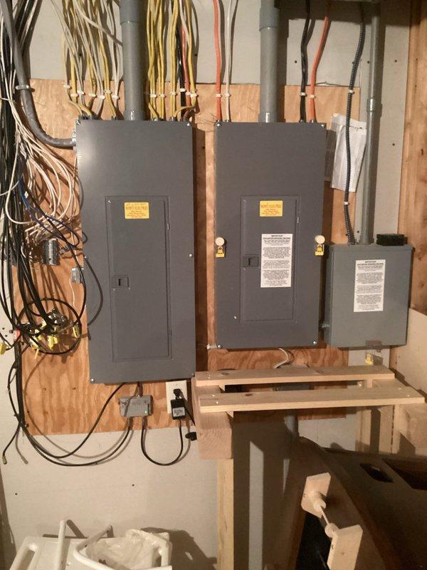 Completed routine plumbing inspection service as requested. Identified sand particles in the toilet, indicating a potential need for pre-filter installation before the water softener system. Documented electrical panel setup and water treatment system for reference.