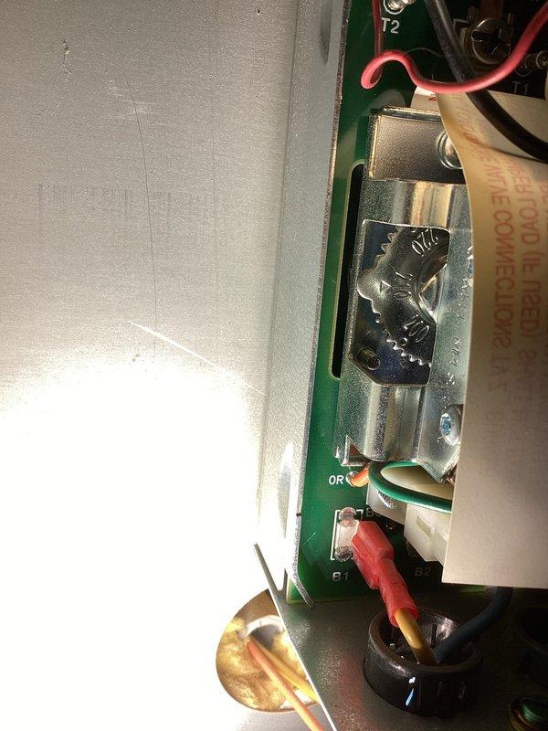 Performed annual boiler tune-up maintenance per agreement. Found system operating with excessive aquastat temperature (210°) causing water to boil and create air in system, and gas pressure set above 4.00. Corrected issues by adjusting aquastat to 180°, reducing gas pressure to 3.48, purging air from radiators, and setting water pressure to 18 psi. Cleaned burners and burner area, adjusted fresh air intake piping for improved operation, and verified system returned to normal operation.