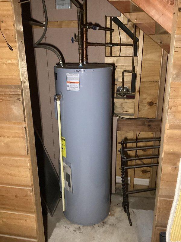 Performed comprehensive furnace tune-up on FRP unit of indeterminate age. Inspected and verified all components including clean filter, properly functioning blower, and electrical components within specifications. Cleaned condensate trap, confirmed clear drainage lines, inspected heat exchanger integrity, verified proper gas pressures, and examined venting system. System operated correctly during extended testing period. Noted basement leak and aging water heater to customer.