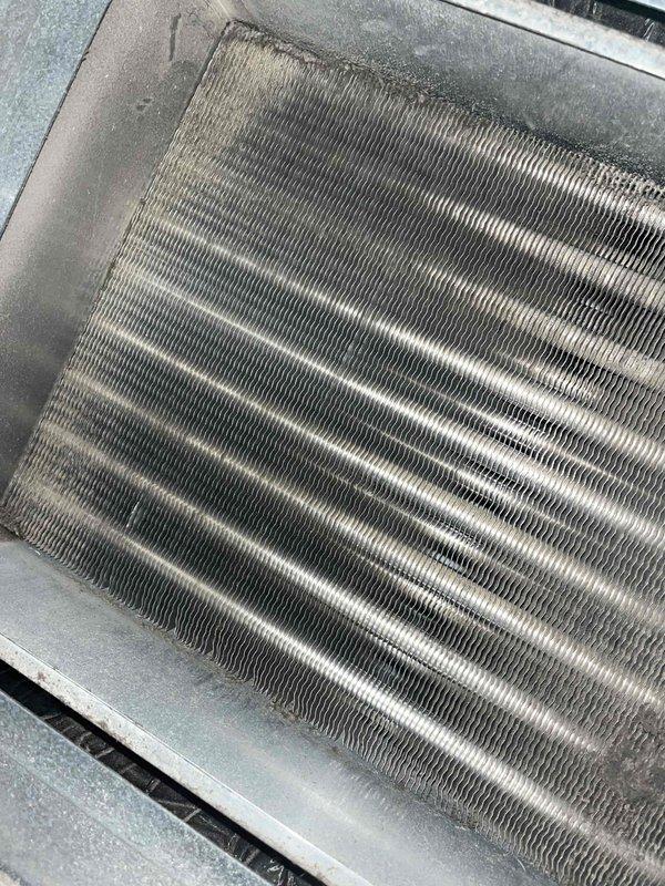 Responded to follow-up service call after previous blower motor replacement. Diagnosed Error 311 code caused by plugged secondary heat exchanger. Performed thorough cleaning of secondary heat exchanger, verified proper operation with no overheating issues, and confirmed furnace is now functioning correctly.