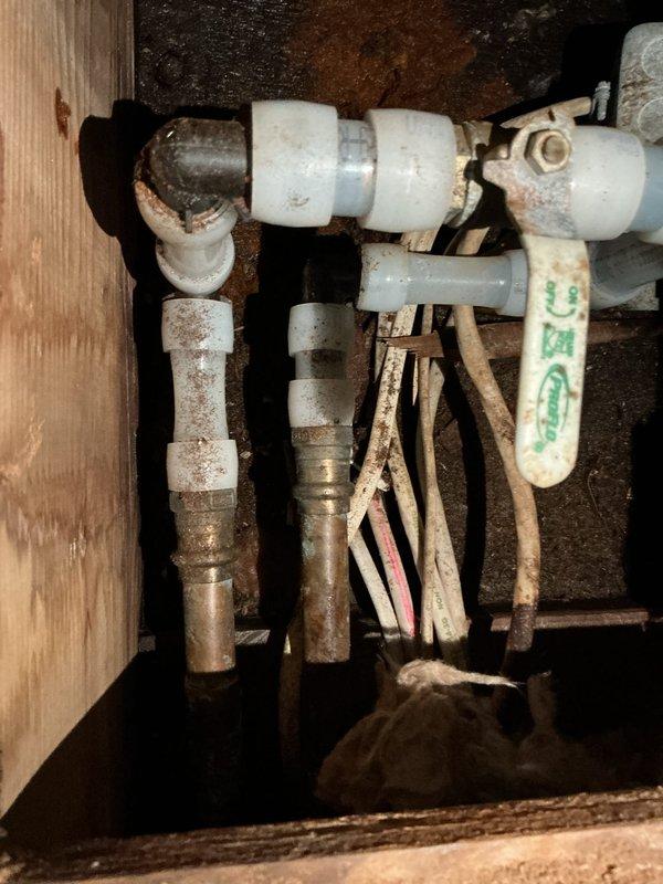 Responded to emergency service call for a burst pipe. Located and repaired multiple leaks including a faulty Apex 90 connection beneath the kitchen sink and a compromised main shut-off valve. Replaced all damaged components with new parts and performed leak verification to ensure proper system function and prevent wall damage as documented in photos.