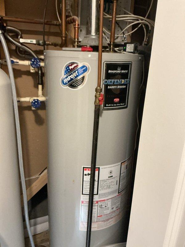 Responded to no hot water complaint for a 50-gallon Bradford White natural gas water heater with chimney vent. Diagnostic testing revealed the unit was functioning properly, but customer had depleted hot water supply due to accidentally leaving kitchen faucet running for extended period. Verified proper operation of Defender Safety System and HydroJet components, with no issues found in the tank or connected plumbing.