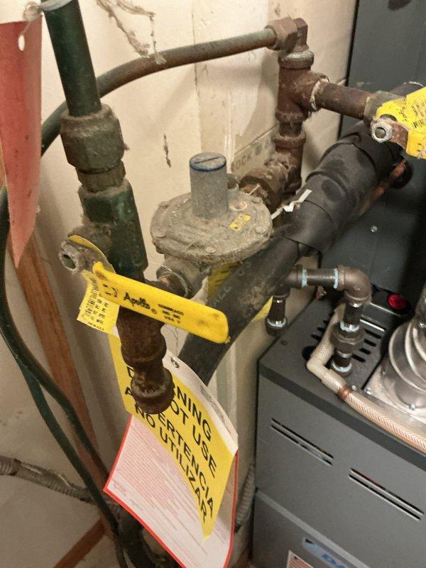 Responded to urgent service call for gas regulator failure. Upon inspection, confirmed the gas company had shut off and tagged the main gas supply due to regulator malfunction. Replaced defective gas regulator (325-3L, 2 PSG Class 1, Po 7"-11" CSA certified) to restore proper gas pressure to the furnace system, allowing safe resumption of heating service.