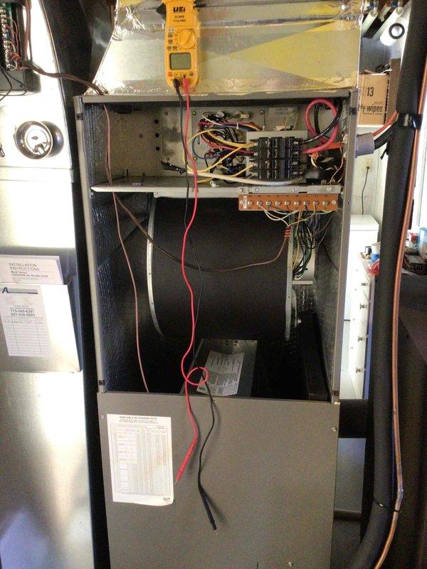 Responded to no heat call for 1-year-old furnace with blank thermostat. Discovered blown 3-amp fuse on EIM module caused by outdoor unit in heat pump mode. Diagnosed high pressure issue (550 psi liquid line) with system tripping on high limit. Replaced dirty air filter but determined system has a restriction in refrigerant flow, likely in reversing valve or filter dryer. Scheduled follow-up service to pinpoint exact restriction location and replace necessary components.
