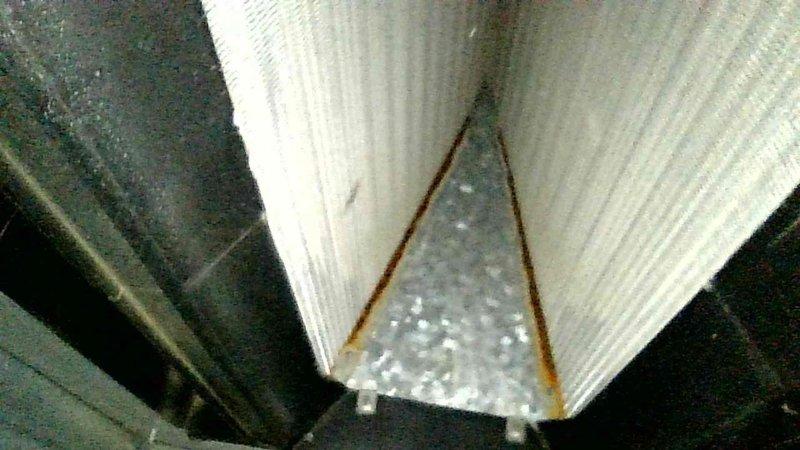 Responded to no-heat call for 20+ year old system. Diagnostic testing revealed inducer motor was operating but HSI wasn't glowing despite normal board signals. Discovered debris obstructing pressure switch hoses from collector box; cleared all four ports using thermostat wire and compressed air. System restored to normal operation after cleaning. Customer advised about aging equipment but declined replacement quote at this time.