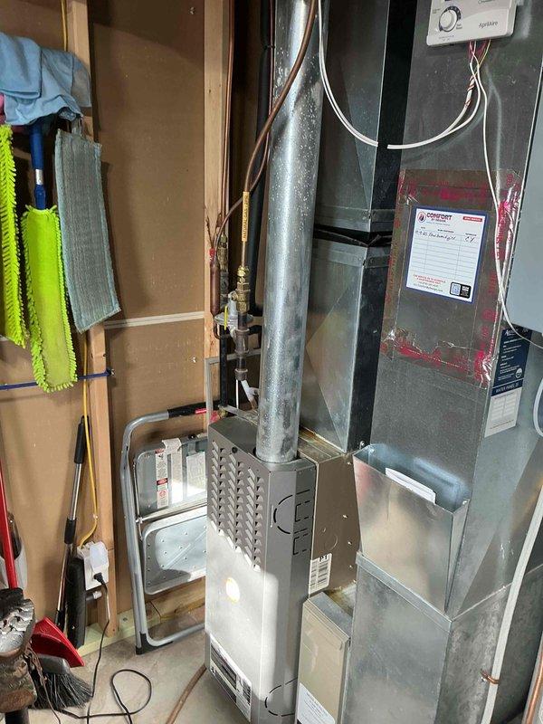 Conducted assessment of existing 40-gallon natural gas standard vent water heater, which showed signs of corrosion despite still being operational. Determined a 50-gallon natural gas standard vent water heater would better accommodate growing family needs. Provided replacement options to customer, including potential for combined HVAC and water heater replacement. Customer will consider options presented.