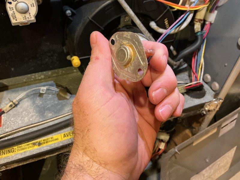 Responded to no-heat service call for 23-year-old furnace failing to maintain set temperature. Diagnosed multiple critical issues: control board malfunction preventing proper blower motor operation, high limit switch tripping causing lockout, and compromised secondary heat exchanger with visible rust-through causing exhaust leakage. Due to safety concerns and component failures, recommended complete furnace replacement. Scheduled same-day estimate for new system, including AC replacement options to address condensation issues.