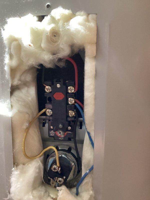 Serviced 15-year-old, 80-gallon electric water heater that was not providing sufficient hot water duration. Diagnosed significant sediment build-up at tank bottom. Replaced both heating elements and thermostats, and performed partial sediment removal using vacuum to restore proper heating function and efficiency.