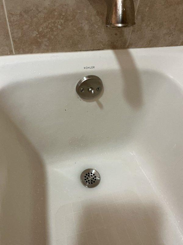 Successfully retrieved customer's necklace from bathroom sink drain using specialized extraction tools. Inspected tub drainage issue, identified blockage, and provided detailed estimate for necessary repairs to restore proper drainage function.