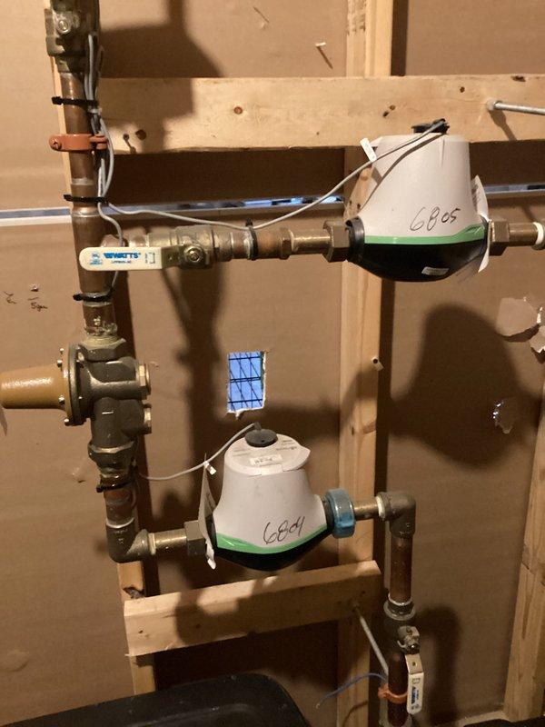 Repaired kitchen sink leak by installing a new continuous waste assembly after identifying that the existing waste pipe was separating. Inspection revealed water damage to the cabinet base, indicating ongoing leakage. System now functioning properly with no leaks observed at connection points.